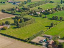 Schitterend gelegen grond op ca. 6682m² te koop nabij Kortrijk