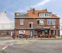 Handelspand met woonst te koop Merksem
