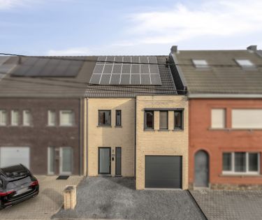 Ruim instapklaar huis: 4 slaapkamers, garage en grote tuin