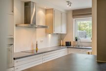 Ruim instapklaar huis: 4 slaapkamers, garage en grote tuin