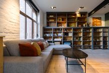 Magazijn (ca. 675 m²) met woonst (258 m²) te koop in Ruien