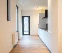 Koetshuis met 2 slaapkamers en tuin te huur in centrum Gent