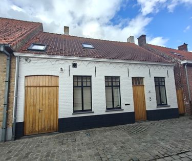 Charmante woning met 3 slaapkamers en tuin in Reninge