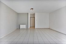 Instapklaar gelijkvloers appartement met gemeenschappelijke tuin en fietsenberging in hartje Kapellen!