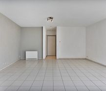 Instapklaar gelijkvloers appartement met gemeenschappelijke tuin en fietsenberging in hartje Kapellen!