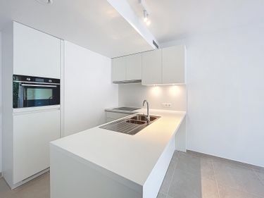 Nieuwbouwappartement + garagebox te huur Oostende 