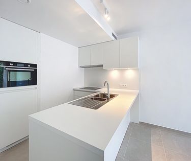 Nieuwbouwappartement + garagebox te huur Oostende