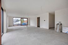 New construction project in Genk with 3 houses and 5 apartments