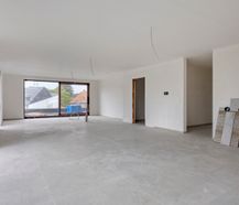 New construction project in Genk with 3 houses and 5 apartments