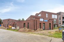 New construction project in Genk with 3 houses and 5 apartments
