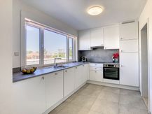 Penthouse te huur in centrum Ieper met prachtig zicht over de stad.
