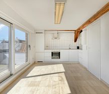 Exclusief duplexappartement met royaal uitzicht en privatieve staanplaats