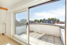 Exclusief duplexappartement met royaal uitzicht en privatieve staanplaats