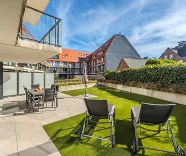 Recent appartement met twee slaapkamers en zonnige tuin