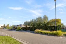 Magazijn (605 m²) met woning (255 m²) te koop in Temse