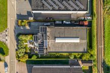 Magazijn (605 m²) met woning (255 m²) te koop in Temse