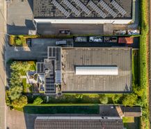 Magazijn (605 m²) met woning (255 m²) te koop in Temse