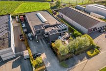Magazijn (605 m²) met woning (255 m²) te koop in Temse