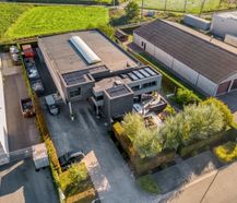 Magazijn (605 m²) met woning (255 m²) te koop in Temse