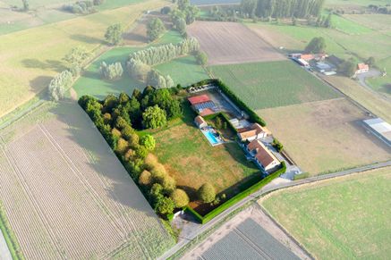 Huis met magazijn te koop Zwevezele