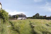 Ruim perceel (1.224m²) langs de Woestinestraat te Sijsele (Damme)