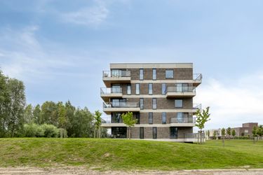 Apartment for sale surrounded by greenery and water in Harelbeke