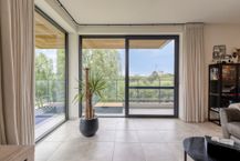 Apartment for sale surrounded by greenery and water in Harelbeke