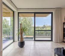 Apartment for sale surrounded by greenery and water in Harelbeke