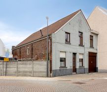 Maison de trois étages à rénover avec grand jardin à Grimbergen