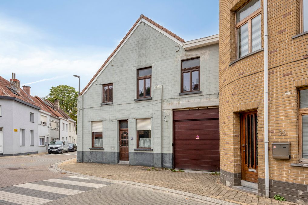 Maison de trois étages à rénover avec grand jardin à Grimbergen