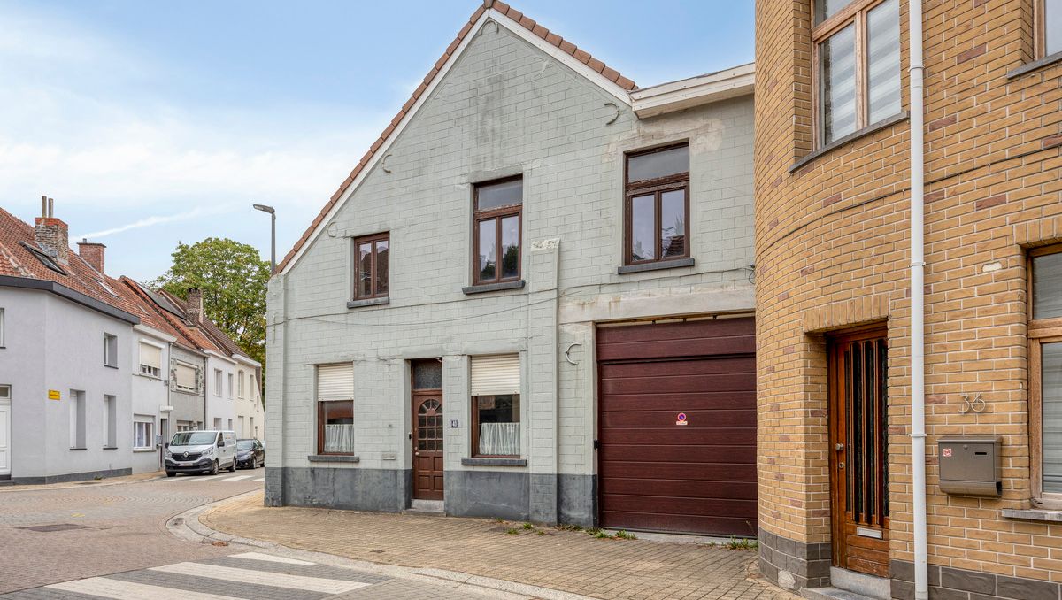 Maison de trois étages à rénover avec grand jardin à Grimbergen
