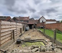 Te renoveren woning met tuin in Deinze