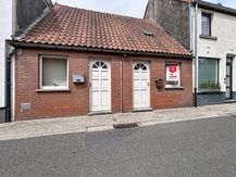 Te renoveren woning met tuin in Deinze