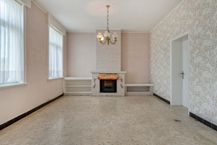 Te renoveren hoeve met landbouwgrond te koop in Wervik! 