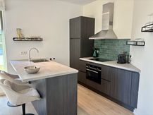 Energiezuinig wonen met terras en zicht op de Rupel in Boom.