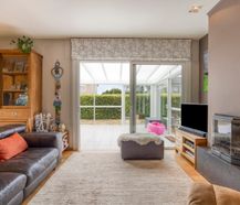 Lichtrijke gelijkvloerse woning op topligging in De Pinte