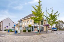 Veelzijdig eigendom met ruime woning, handelspand en magazijn