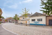 Veelzijdig eigendom met ruime woning, handelspand en magazijn
