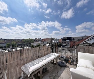 Stijlvol triplex appartement met zonnig terras in Gent