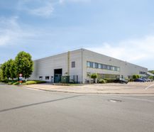Magazijnen (ca. 3911 m²) te huur in industriezone te Wetteren