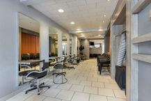 Handelspand met appartement, tuin en bijgebouw te koop in Wilrijk