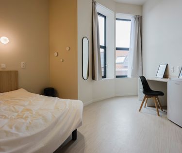 Bemeubelde studentenkamer te koop in centrum Kortrijk