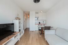 Zonnige studio met terras en magnifiek zicht op de duinen