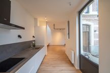 Koetshuis met 2 slaapkamers en tuin te huur in centrum Gent