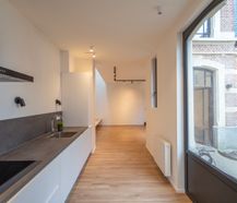 Koetshuis met 2 slaapkamers en tuin te huur in centrum Gent
