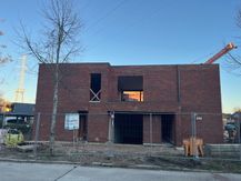 Nouveau projet de construction à Genk avec 3 maisons et 5 appartements