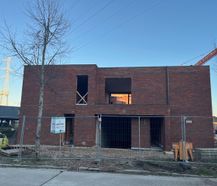 Nouveau projet de construction à Genk avec 3 maisons et 5 appartements