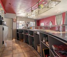 Handelshuis met woongelegenheid te koop in Hertsberge