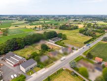 Industrieel projectgrond te koop in Ingooigem. 
