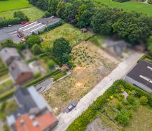 Industrieel projectgrond te koop in Ingooigem.